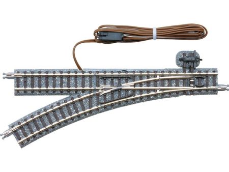 TOMYTEC Elektrische Weiche, links, in Schotterbettung