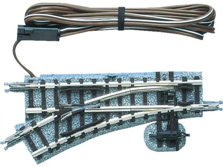 TOMYTEC Elektrische Weiche, links, in  Schotterbettung