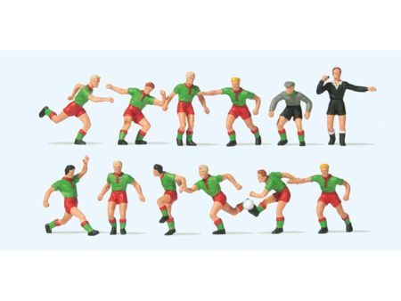 Preiser HO Fussballmannschaft.Grüne Trikots, rote Hosen